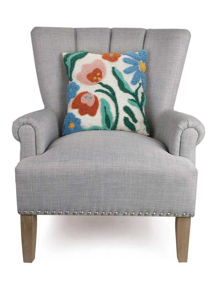 Rainbow pastel abstract Florals Hook Pillow on grey arm chair