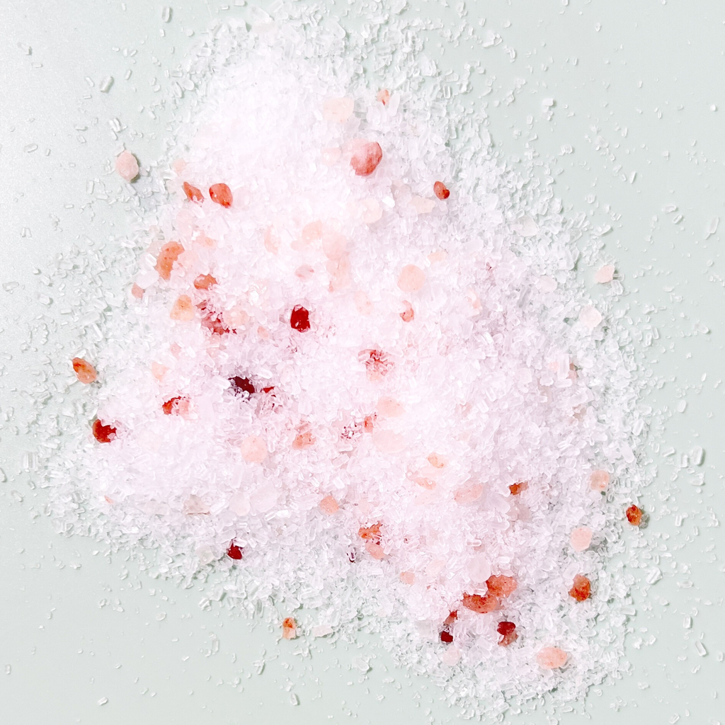 The Moon Salt Soak in Lavender salt bath pile on counter
