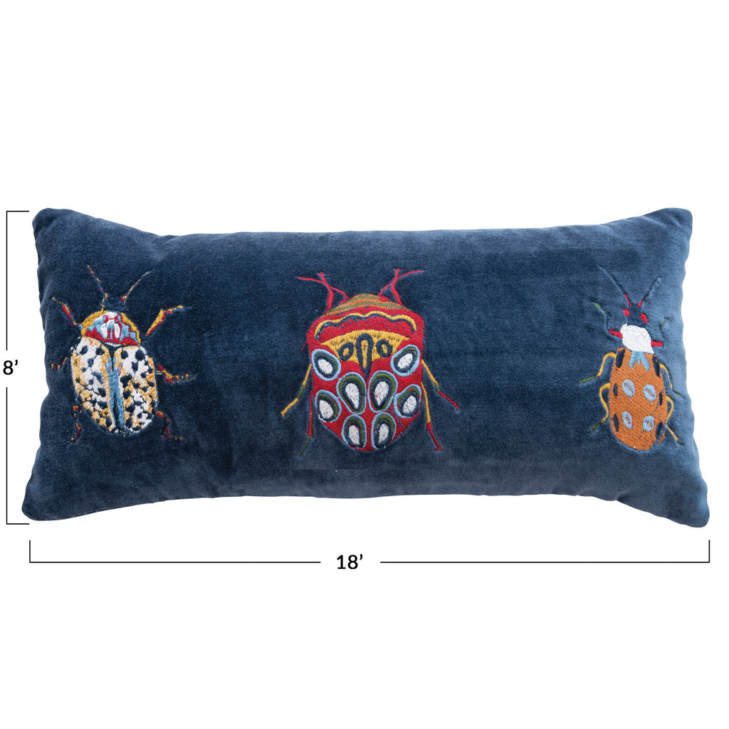 Dark Blue Velvet Lumbar Pillow with 3 Embroidered Beeltes in white, orange, and red tones and dimensions 8in x 18in
