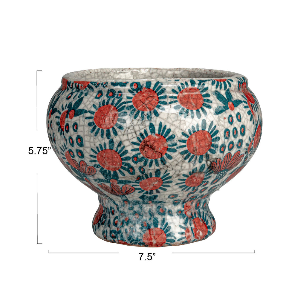 blue and red floral printed footed planter  with dimensions saying 5.75in x 7.5in