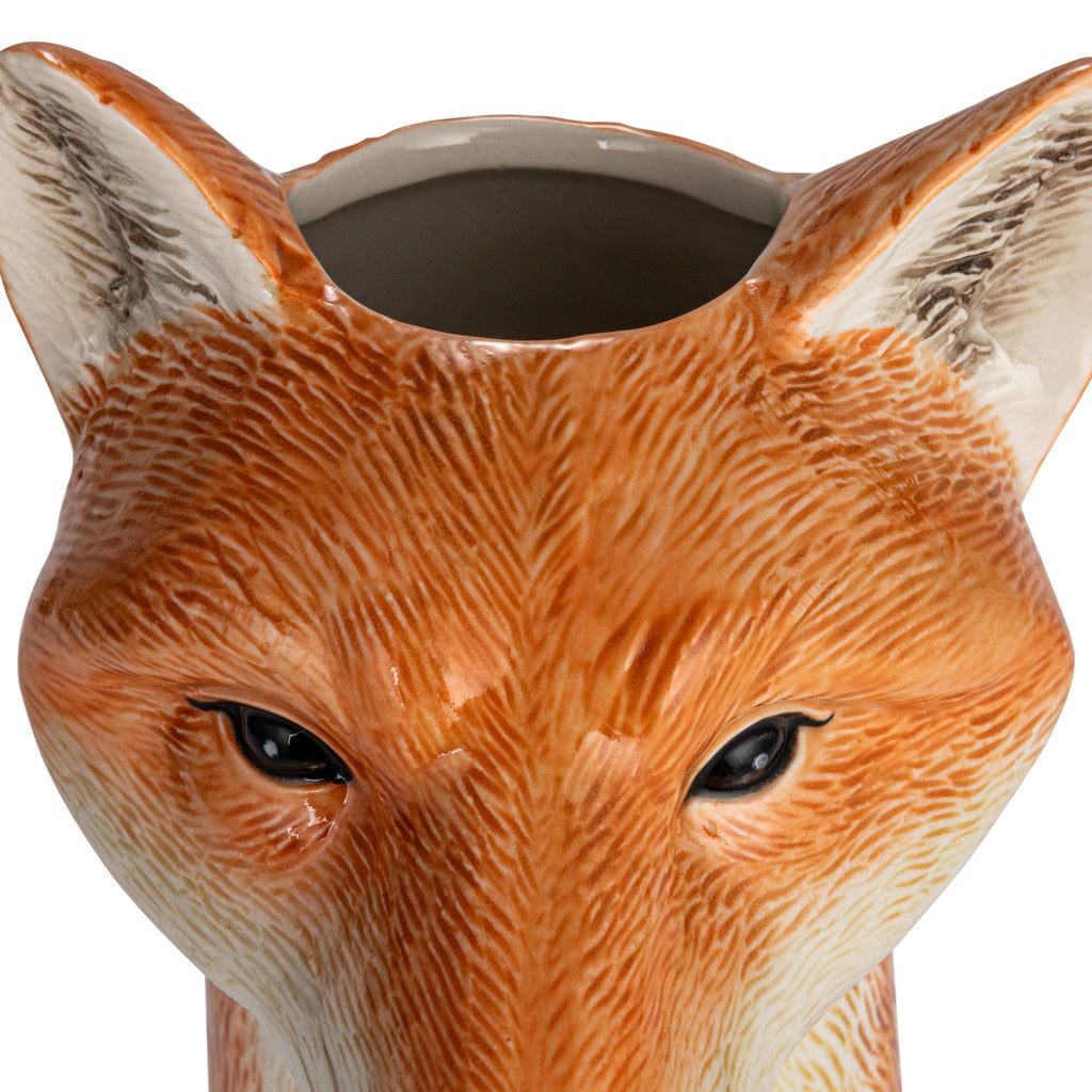 Top view with vase top of Hand-Painted Stoneware Fox Vase in orange and white.