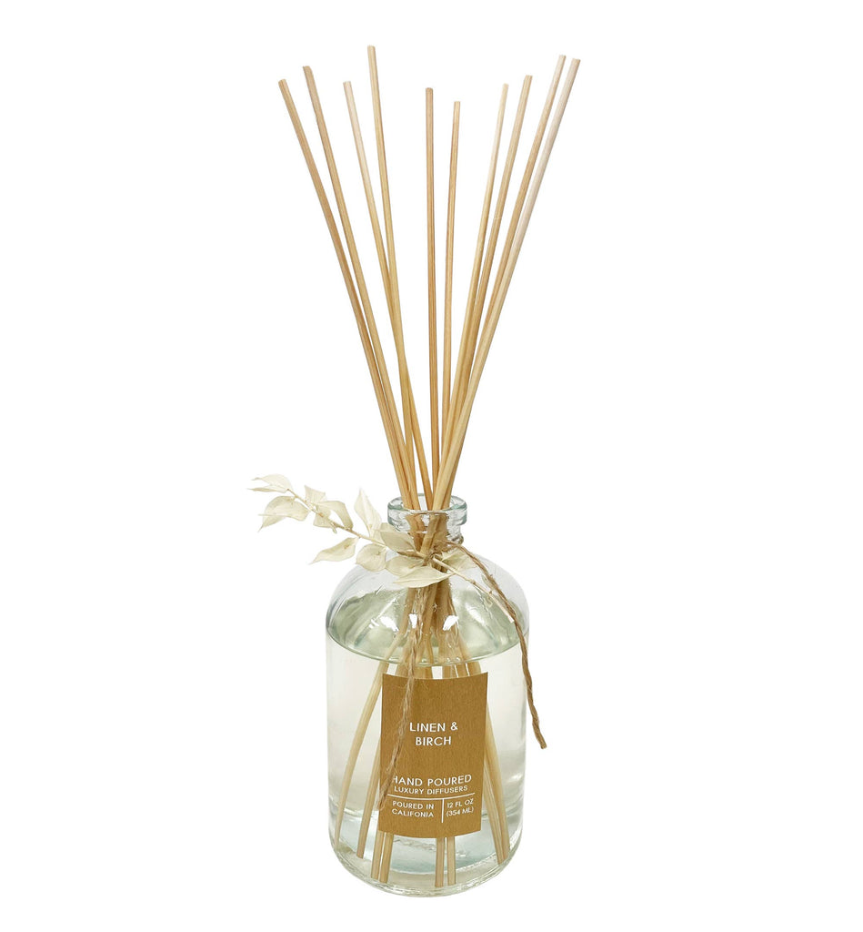 Linen & Birch Botanical Tie Reed Diffuser with a sprig of ruscus tied to the neck