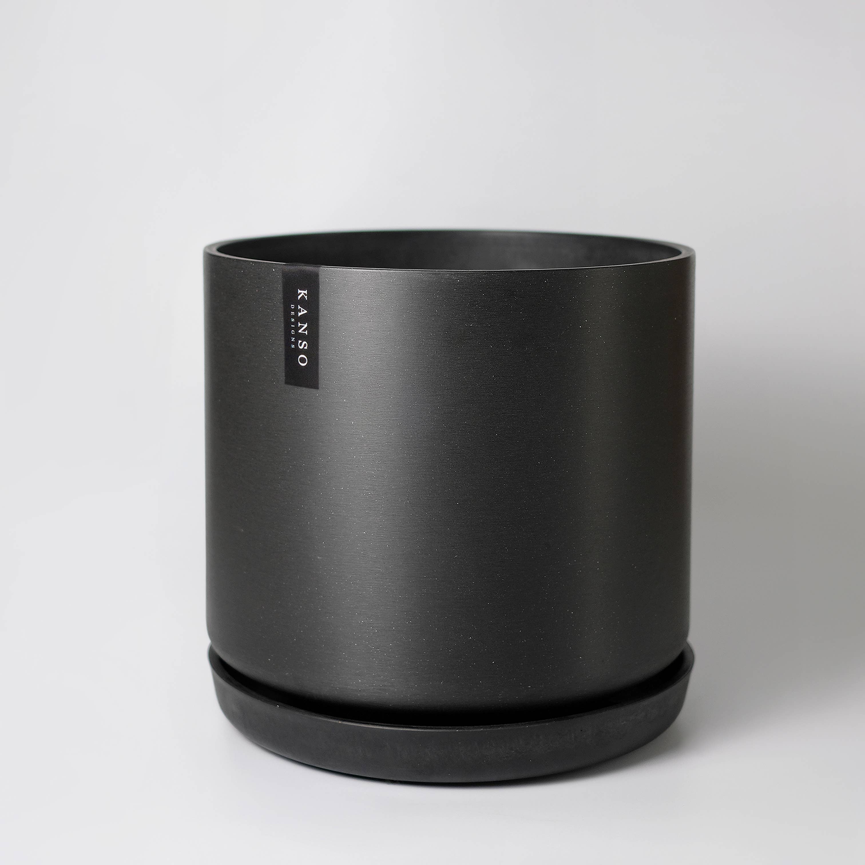 a plastic plant email 12in Black Planter & Saucer