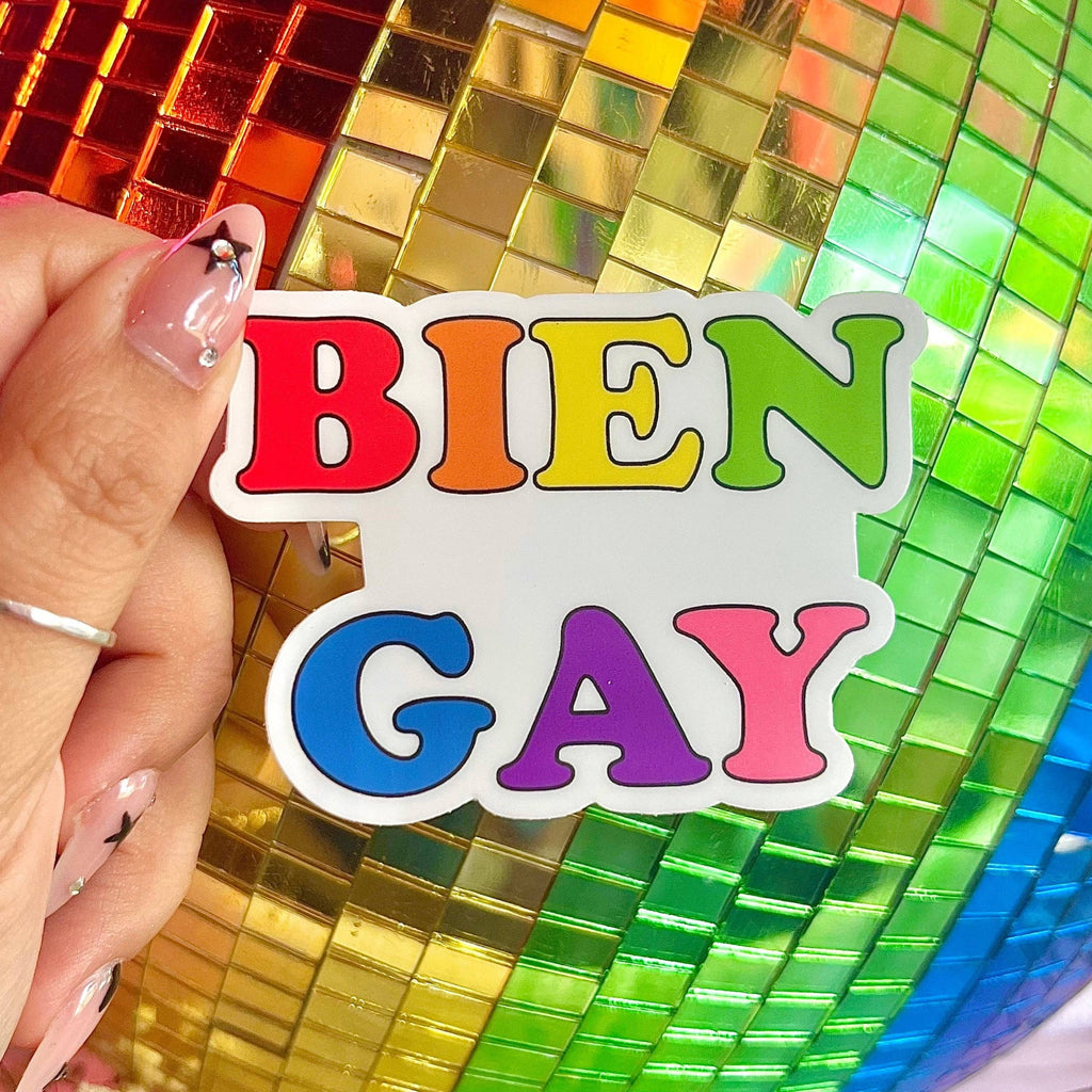 Bien Gay Sticker in front of rainbow disco ball
